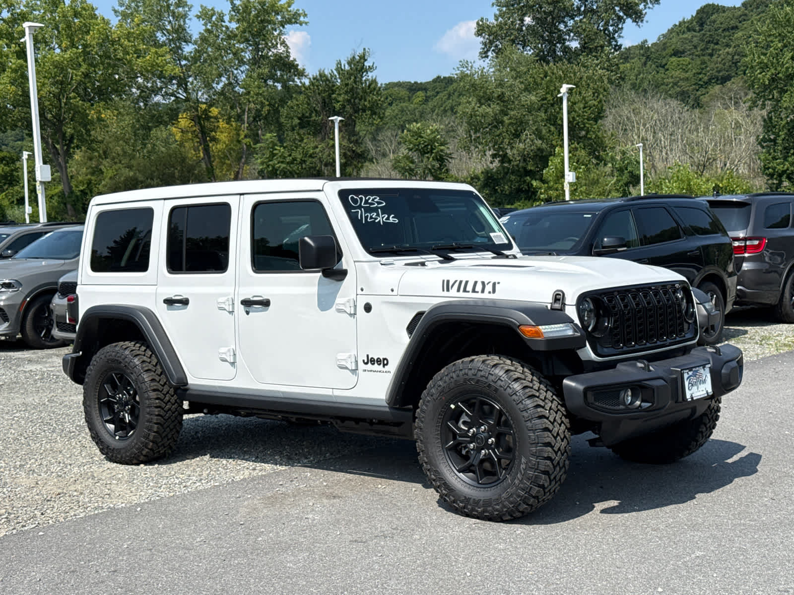 2026 Jeep Wrangler Willys in Bright White Clearcoat — front three-quarter view
