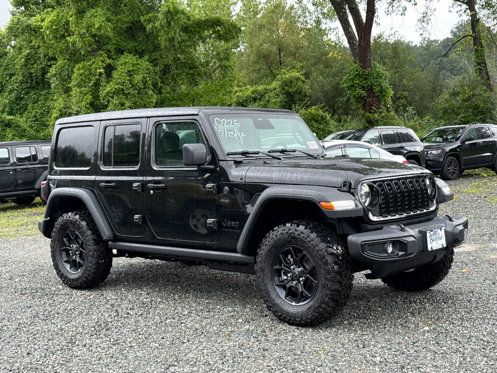 2026 Jeep Wrangler Willys in Black Clearcoat — front three-quarter view