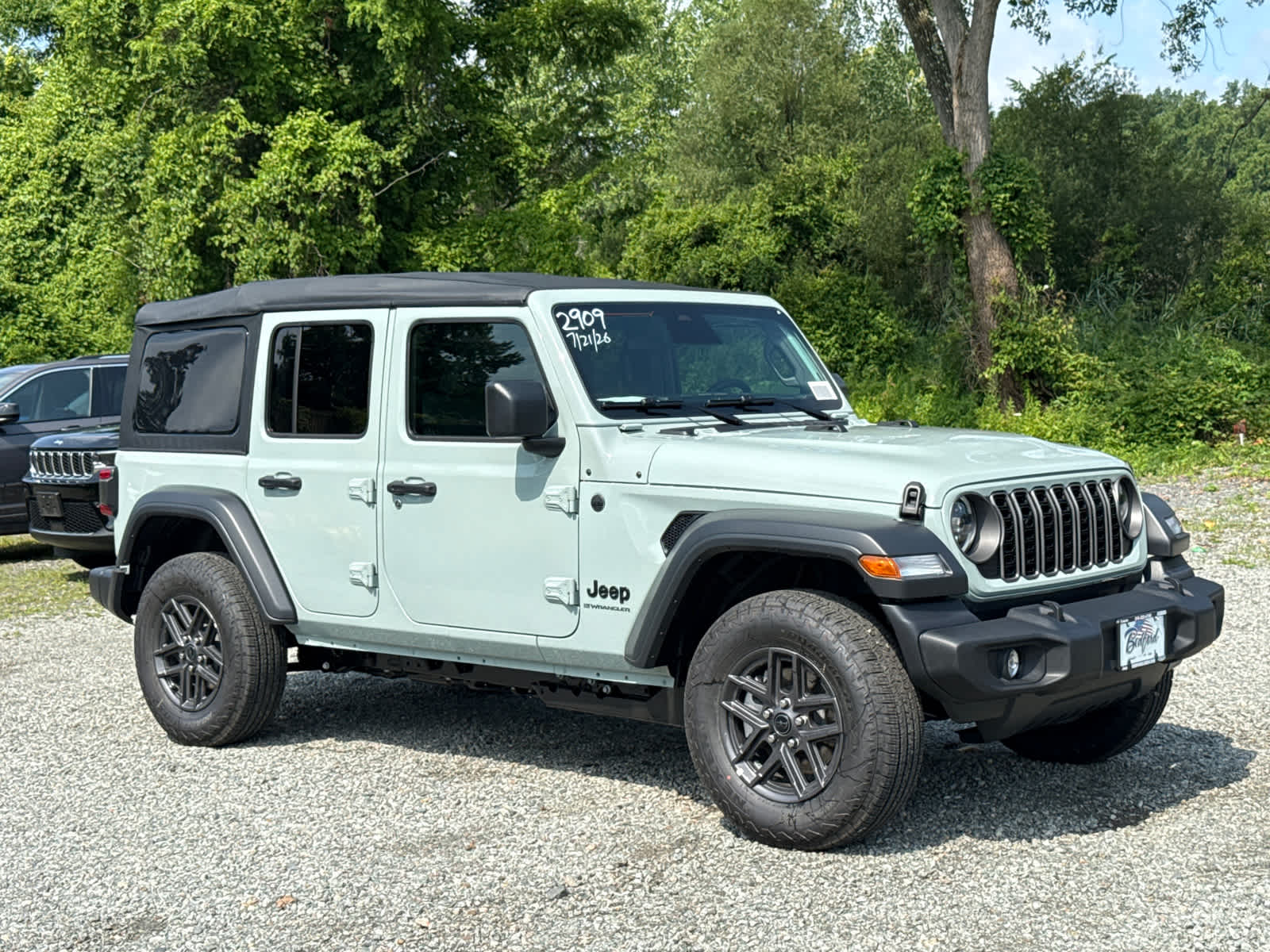 2026 Jeep Wrangler Sport S in Earl Clearcoat — front three-quarter view
