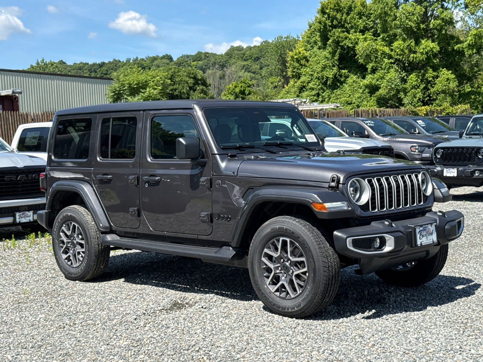 2026 Jeep Wrangler Sahara in Granite Crystal Metallic Clearcoat — front three-quarter view
