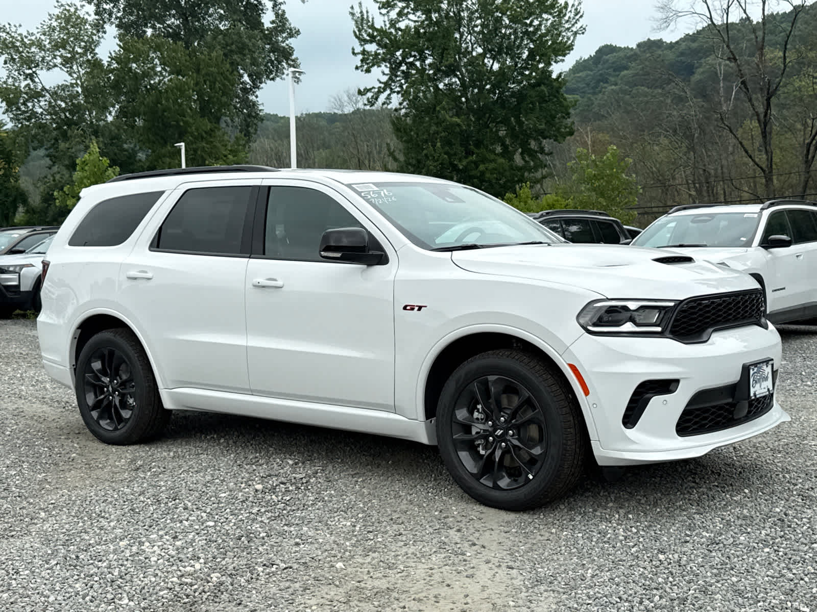 2026 Dodge Durango GT Plus in White Knuckle Clearcoat — front three-quarter view