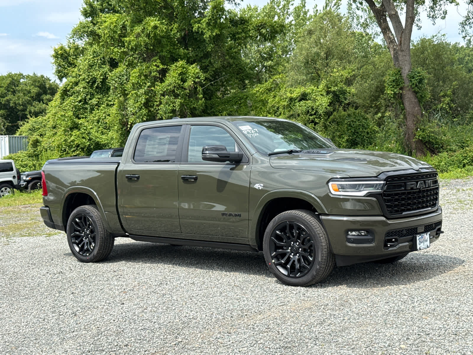 2026 RAM 1500 Limited in Gr — front three-quarter view
