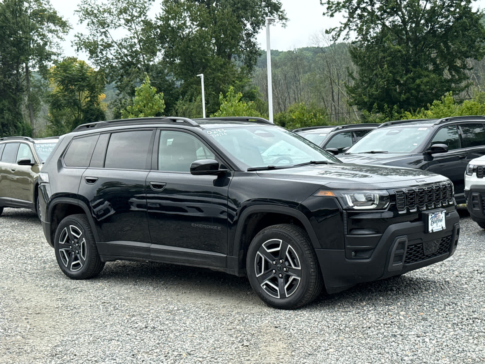2026 Jeep Cherokee Limited in Diamond Black Crystal Pearlcoat — front three-quarter view